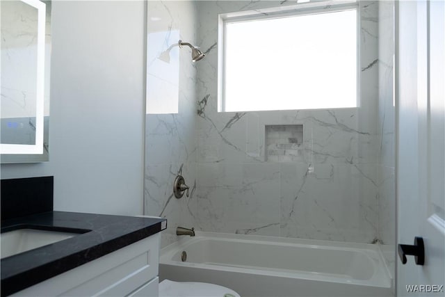 full bathroom with toilet, washtub / shower combination, and vanity