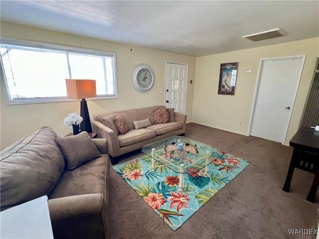 living room with carpet floors and visible vents