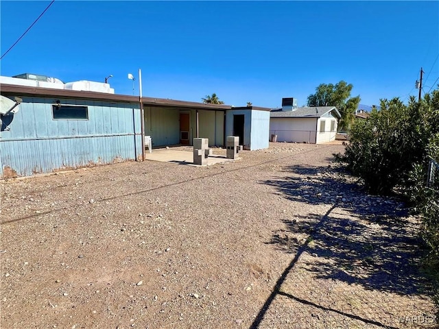 view of front of property featuring a patio