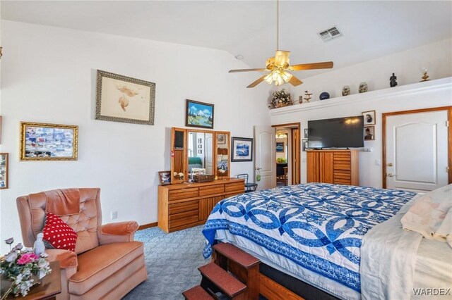 bedroom featuring baseboards, visible vents, vaulted ceiling, and carpet flooring