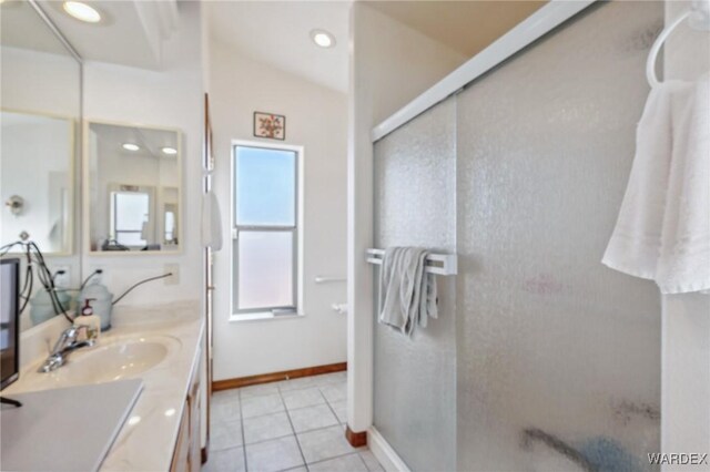 full bathroom featuring recessed lighting, a stall shower, vanity, baseboards, and tile patterned floors