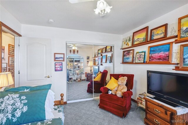 interior space featuring carpet floors, a closet, and baseboards