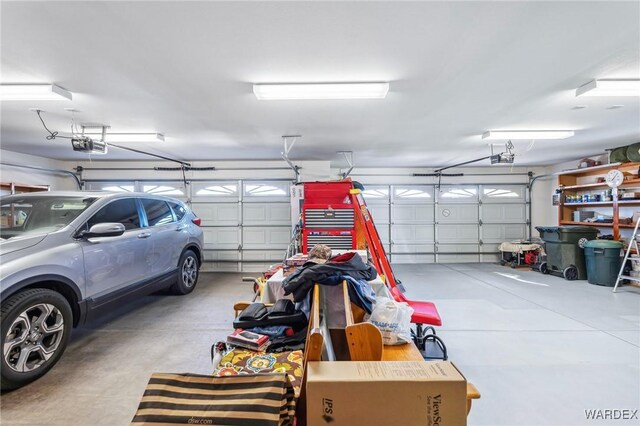 garage featuring a garage door opener