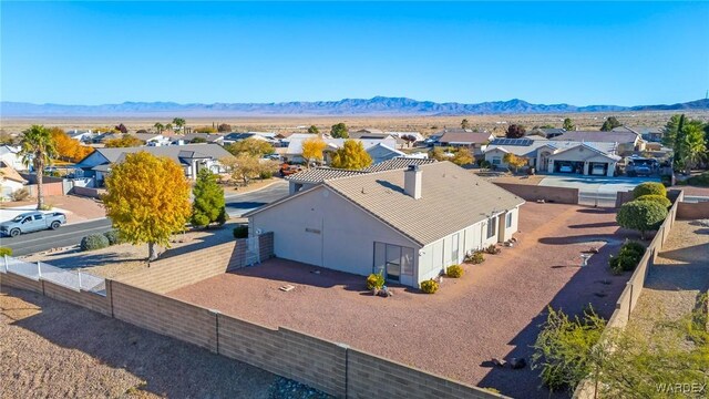 aerial view with a mountain view and a residential view