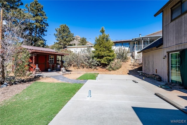 view of patio / terrace with an outdoor structure