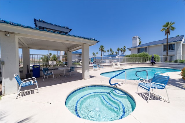 1800 Clubhouse Dr Unit H70, Bullhead City, AZ 86442 - community pool featuring a patio and a community hot tub