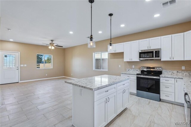 kitchen with visible vents, appliances with stainless steel finishes, white cabinets, and recessed lighting