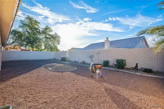 view of yard with a fenced backyard