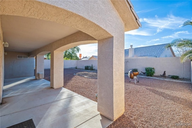 view of patio featuring a fenced backyard