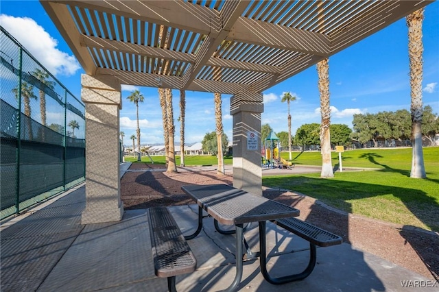 view of patio with fence and a pergola