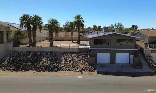 view of front of house with a garage and driveway