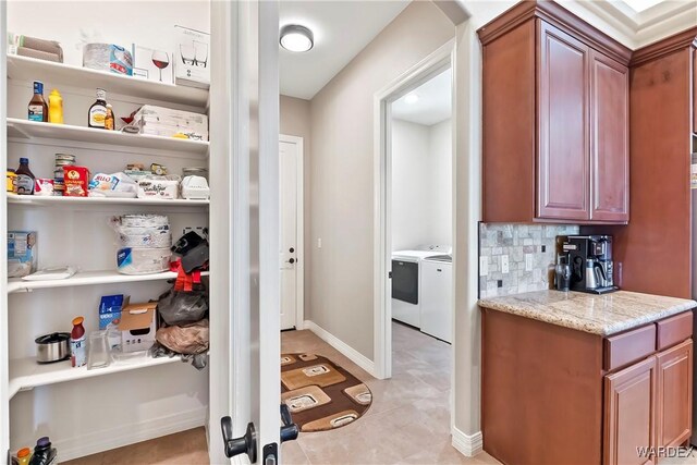 interior space featuring washing machine and clothes dryer