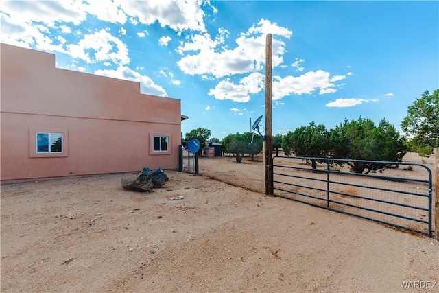 view of yard featuring a gate