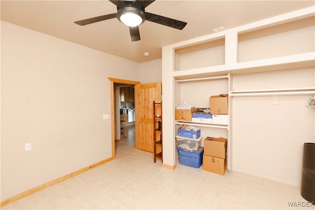 bedroom featuring ceiling fan, visible vents, and baseboards