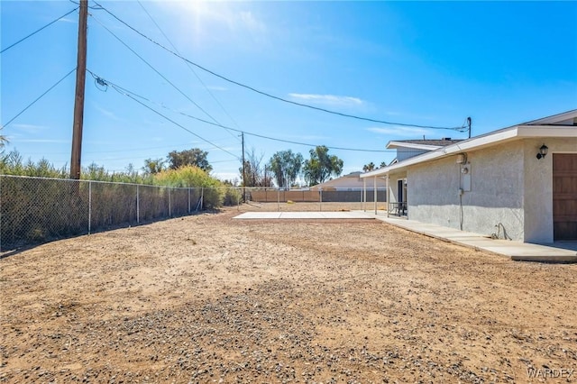 view of yard featuring a fenced backyard and a patio