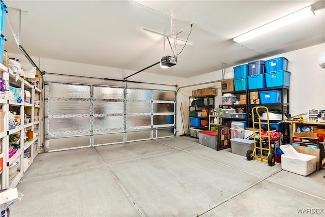 garage featuring a garage door opener