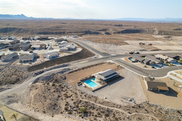 aerial view with a mountain view and a residential view