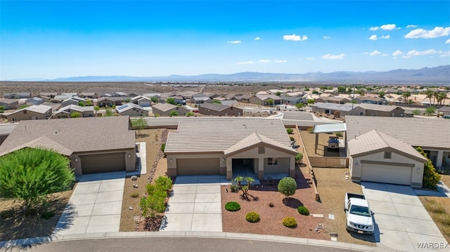 view of front of home featuring a residential view and a mountain view