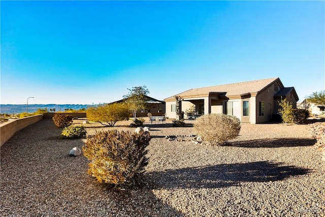 view of front of property featuring stucco siding