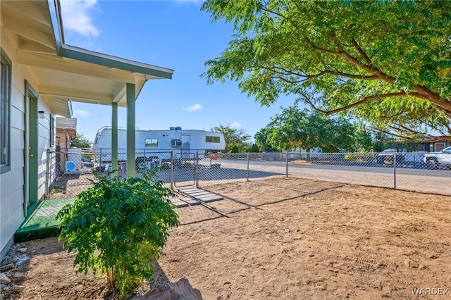 view of property's community featuring fence