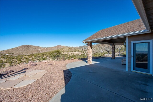 view of patio featuring a mountain view