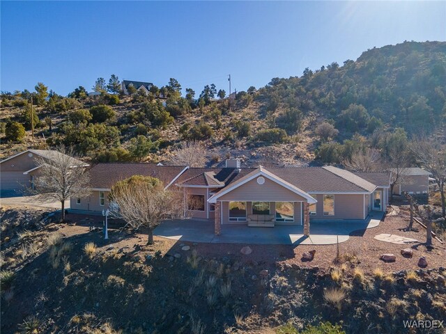 view of front of home featuring a patio area