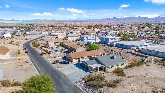 drone / aerial view with a residential view and a mountain view