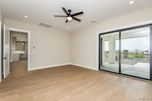 unfurnished room with baseboards, recessed lighting, visible vents, and light wood-style floors