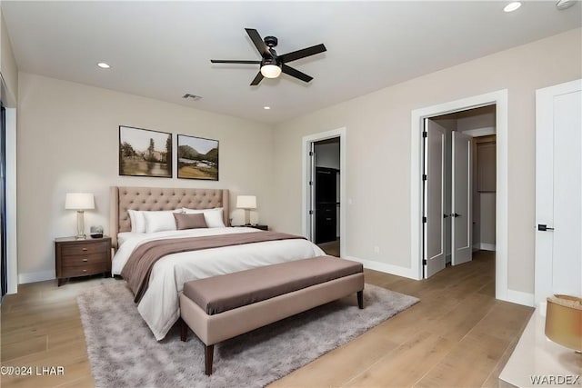 bedroom featuring recessed lighting, visible vents, light wood-style flooring, and baseboards