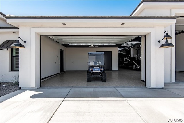 garage featuring driveway