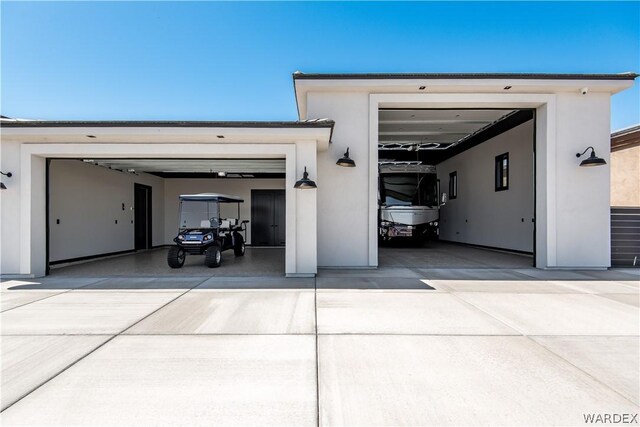 garage featuring driveway