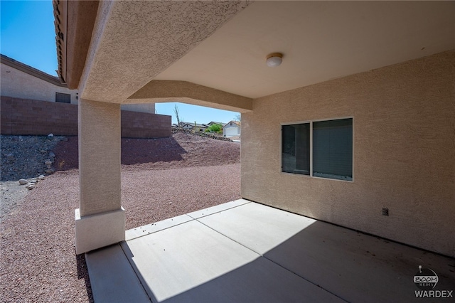 view of patio with fence