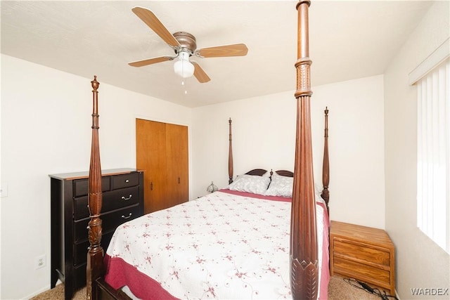 carpeted bedroom with a ceiling fan