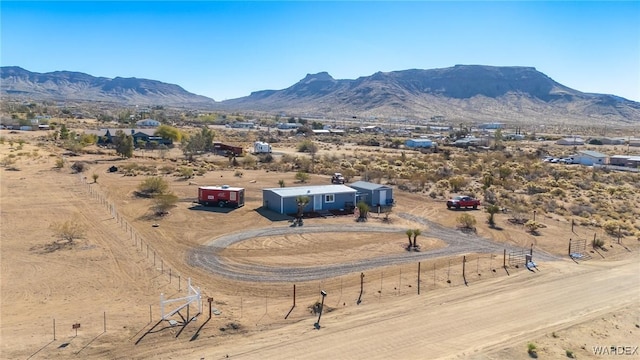 birds eye view of property featuring a mountain view and a rural view