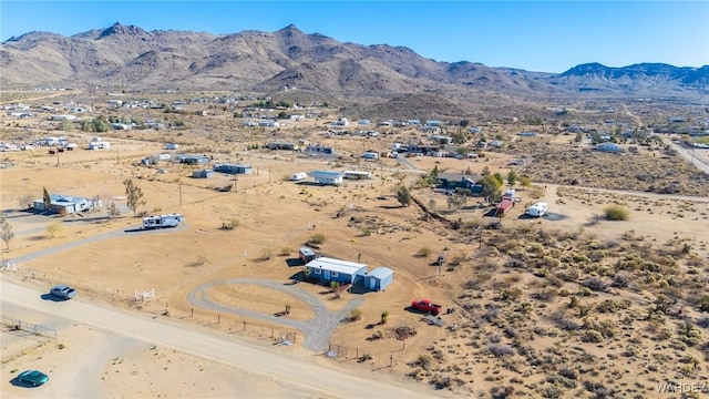 aerial view with a desert view and a mountain view