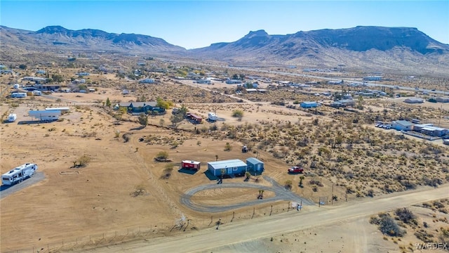 birds eye view of property featuring a mountain view