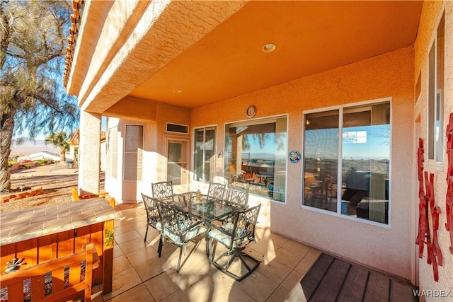 view of patio with outdoor dining area