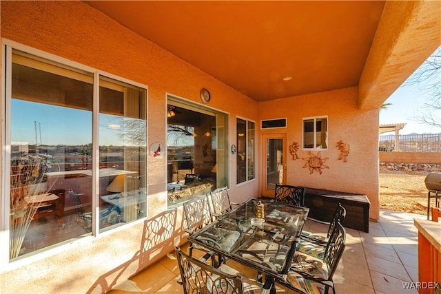 view of patio / terrace with fence and outdoor dining area