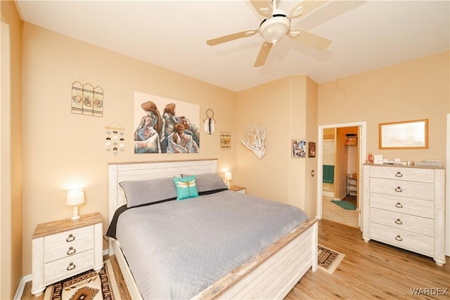 bedroom with ceiling fan and light wood-type flooring