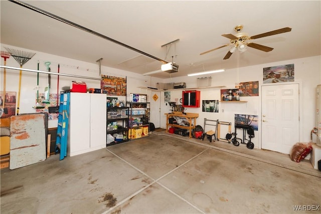 garage with a garage door opener and ceiling fan