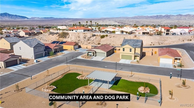 bird's eye view with a residential view and a mountain view