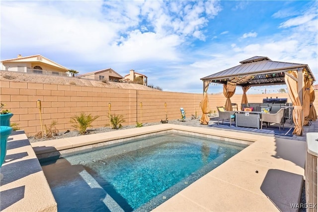 view of pool featuring a gazebo, a patio, a fenced backyard, and a fenced in pool