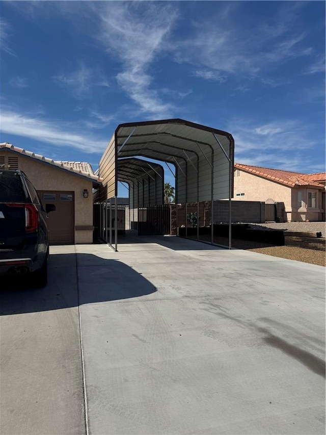 2023 E Sundance Dr, Fort Mohave, AZ 86426 - view of vehicle parking featuring driveway and a carport