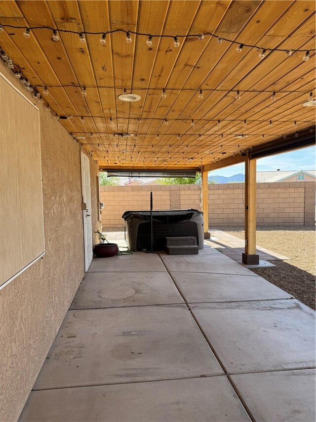 2023 E Sundance Dr, Fort Mohave, AZ 86426 - fenced backyard with a patio and a hot tub