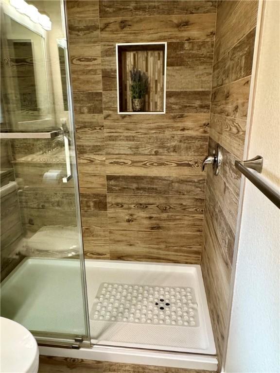 2023 E Sundance Dr, Fort Mohave, AZ 86426 - bathroom with a shower stall and toilet
