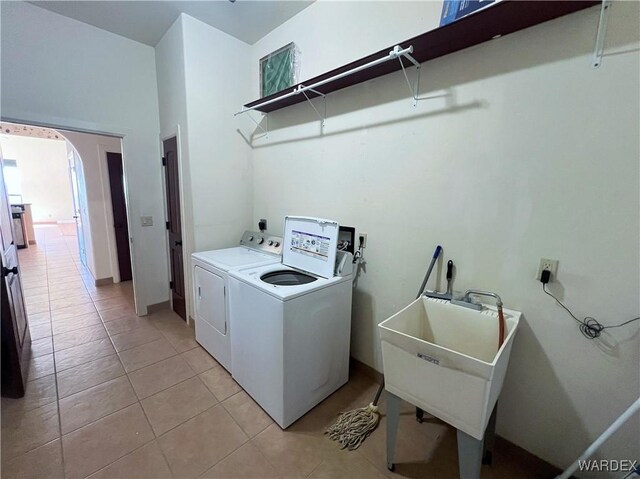 full bathroom featuring shower / bath combo, baseboards, toilet, tile patterned floors, and vanity