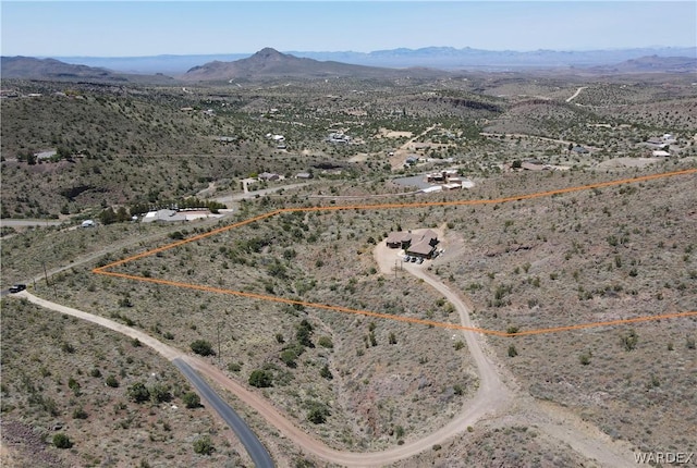 bird's eye view with view of desert and a mountain view