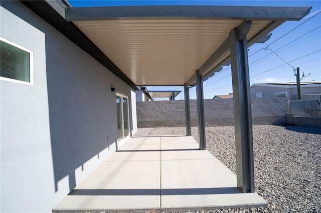 view of patio with fence