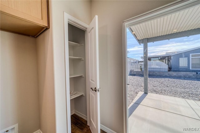 interior space with baseboards