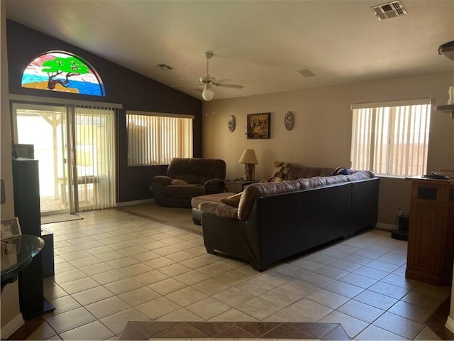 3454 Beale St, Bullhead City, AZ 86442 - living area featuring plenty of natural light, a ceiling fan, light tile patterned floors, and vaulted ceiling